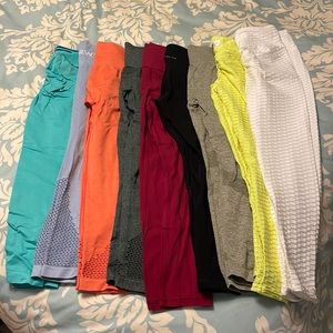 Lot of 9 pairs of medium leggings Ryderwear, doyoueven, paragon, violate..